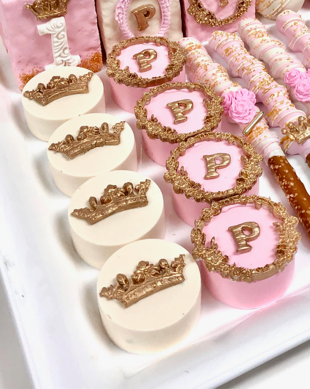 Chocolate covered Oreo cookies with decorated tops