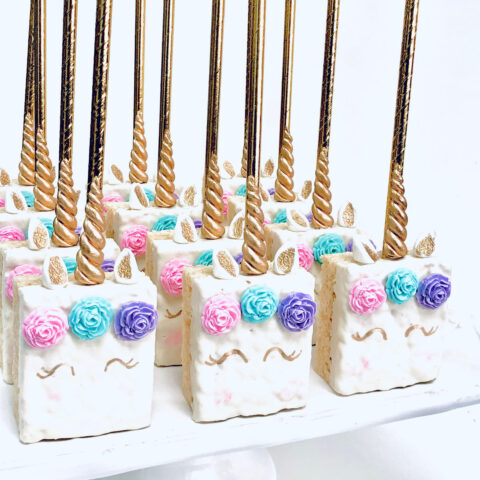 Decorated rice krispies treats on sticks