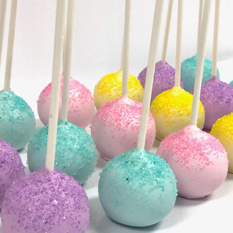Pastel cake pops on sticks, finished with sprinkles